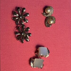 Three pairs of clip on earrings